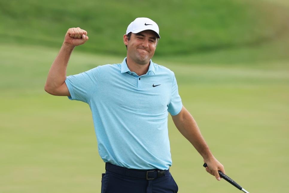 PONTE VEDRA BEACH, FLORIDA - MARCH 12: Scottie Scheffler of the United States celebrates after making his putt to win on the 18th green during the final round of THE PLAYERS Championship on THE PLAYERS Stadium Course at TPC Sawgrass on March 12, 2023 in Ponte Vedra Beach, Florida. (Photo by Sam Greenwood/Getty Images)