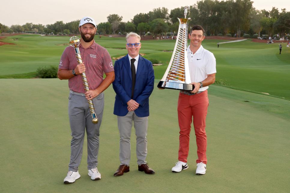 DUBAI, UNITED ARAB EMIRATES - NOVEMBER 20: (L-R) Jon Rahm of Spain, DP World Tour CEO Keith Pelley, and Rory McIlroy of Northern Ireland pose for photos during Day Four of the DP World Tour Championship on the Earth Course at Jumeirah Golf Estates on November 20, 2022 in Dubai, United Arab Emirates. (Photo by Andrew Redington/Getty Images)
